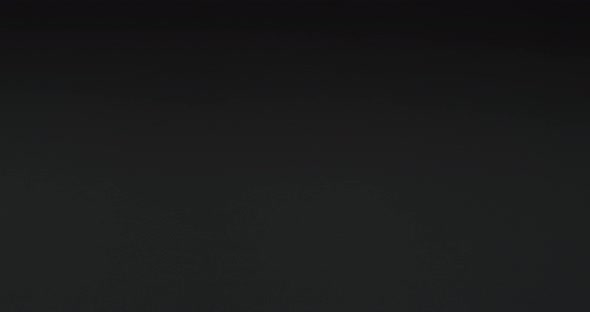 Hand placing the microphone down alt