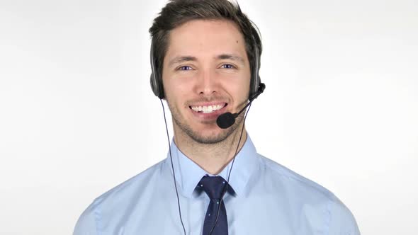 Smiling Young Call Center Agent on White Background, Stock Footage