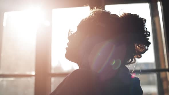 Girl Dancing While Wearing Headphones  alt