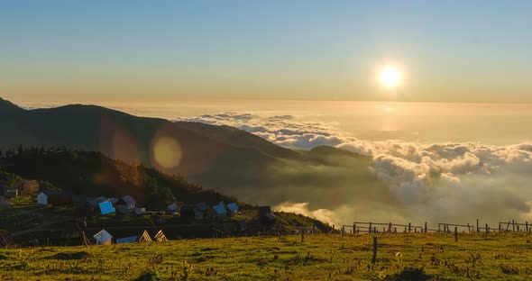 Beautiful slider moving shot above the clouds on sunset at Gomismta, Georgia alt