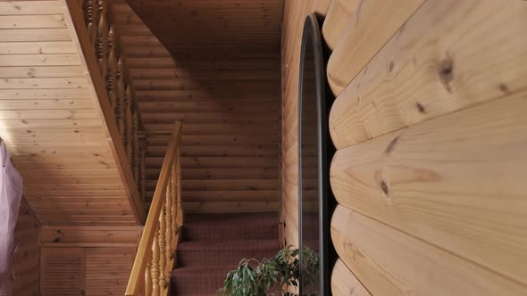House Interior with Wooden Walls and Stairs alt
