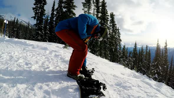 Snowboarder wearing snowboard alt