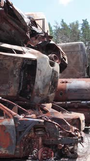 Vertical Video of Wardestroyed Cars in Ukraine alt
