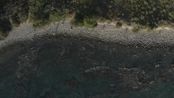 Aerial View Drone Shot of a Curvy Rocky Beach Stripe
