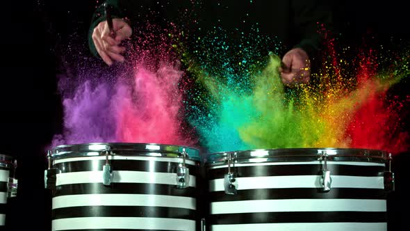 Super Slow Motion Shot of Drum Hit with Color Powder Explosion at 1000 Fps alt