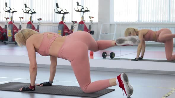 Young woman training in a sports club