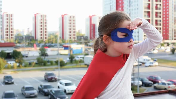 Superhero Kid Against Urban Background