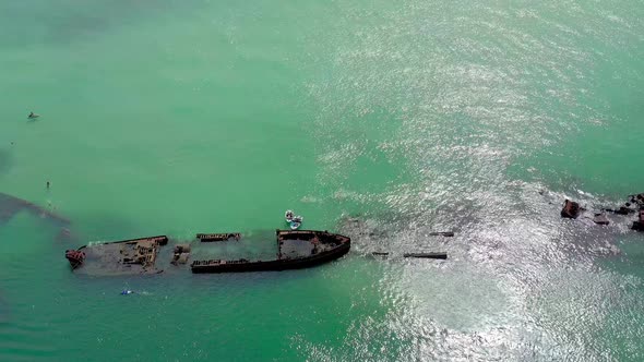 Aerial Flyover of Tangalooma Shipwrecks in Brisbane Australia in the Summer alt