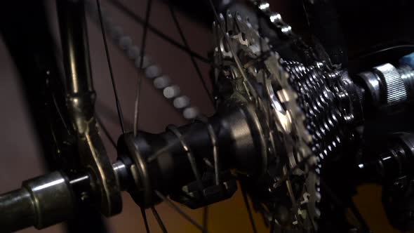 Part of Bike with Wheel Cogwheel is Rotating with Chain and Changing Gear