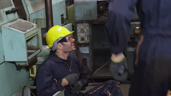 Factory Worker Injured By Accident While Using Machine in Factory alt