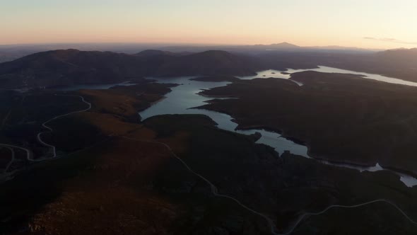 El Atazar dam and Loyoza river at dusk, Spain alt