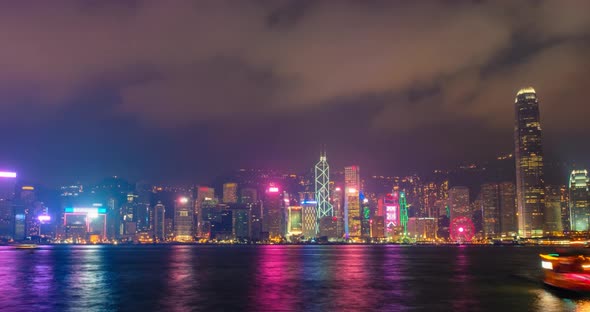 Aerial tNight Imelapse of Illuminated Hong Kong Skyline. Hong Kong, China alt