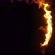 Large ring on fire. Fuel burning in a circle at random on back background. - VideoHive Item for Sale