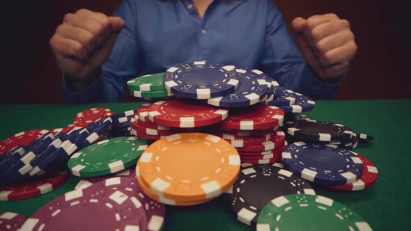 Male Player Betting All Chips in While Playing in Casino Close Up