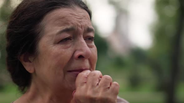 Closeup Portrait Crying Frustrated Senior Caucasian Woman Standing in Park Outdoors alt