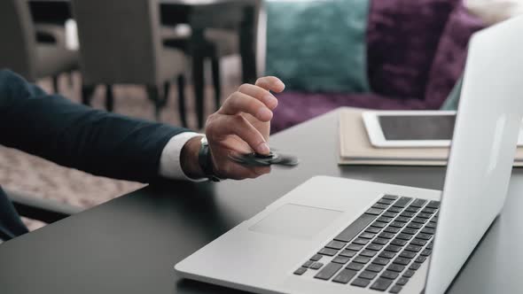 Businessman with a Spinner Confident Director with Spinner Fidget Business Man with Laptop and alt