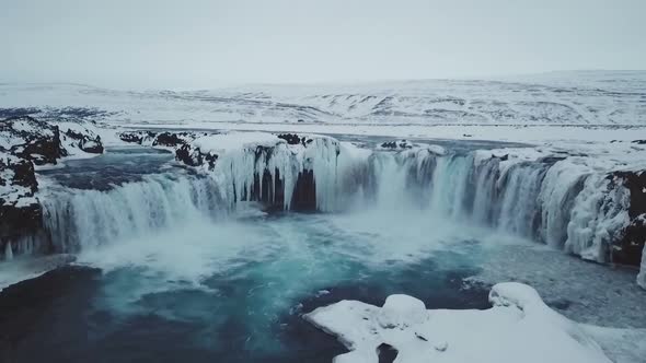Beautiful Winter Aerial View Of Godafoss Waterfalls in Iceland