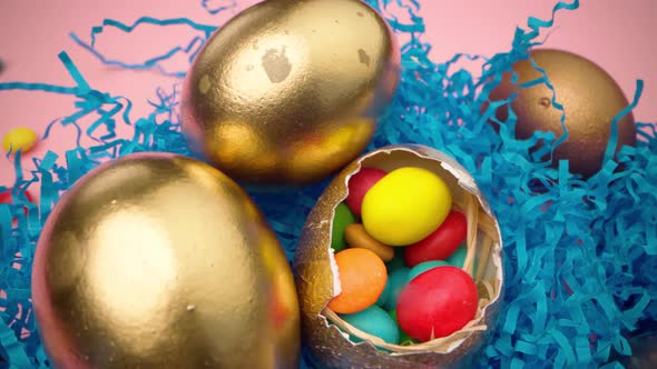 Easter Egg with Colorful Candies in a Basket Close Up