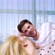 Young Handsome Man Lying on Floor and Smiling to His Beloved Woman in Sunny Room - VideoHive Item for Sale
