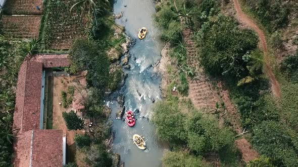 Aerial View People Rafting In The Local River In Indonesia