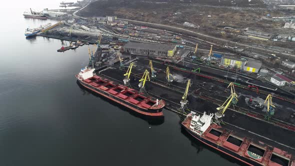 Flight Over Group of Ships on Berths of Murmansk Seaport Waiting for Coal Loading