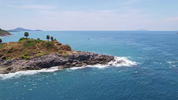 Aerial view phuket seashore Wave crashing on rocks at Laem promthep cape beautiful sea in Phuket alt