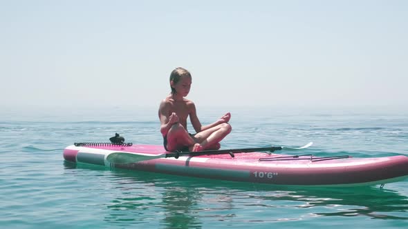 Kid on Paddle Board alt