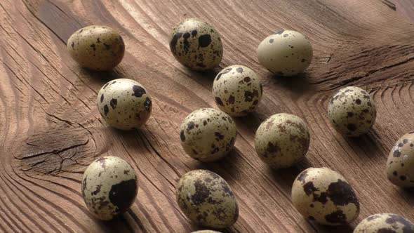 Quail eggs on a wooden board