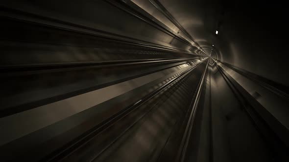 Seamless subway journey through the modern underground empty railway tunnel.