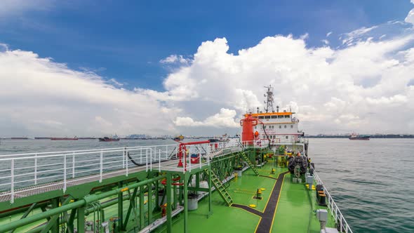 Green Deck of the Tanker Under Blue Sky Timelapse alt