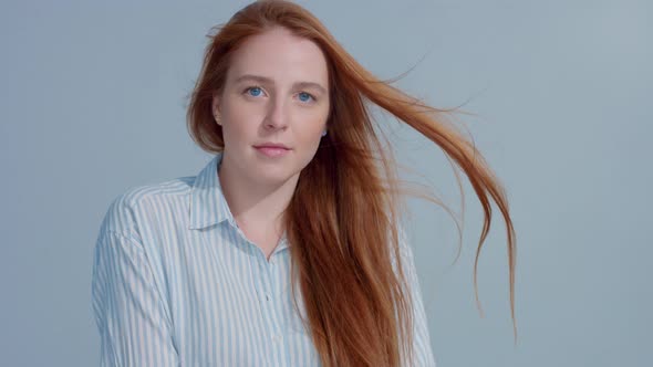 Gingerhead Red Hair, Ginger Hair Model with Blue Eyes on Blue Background alt