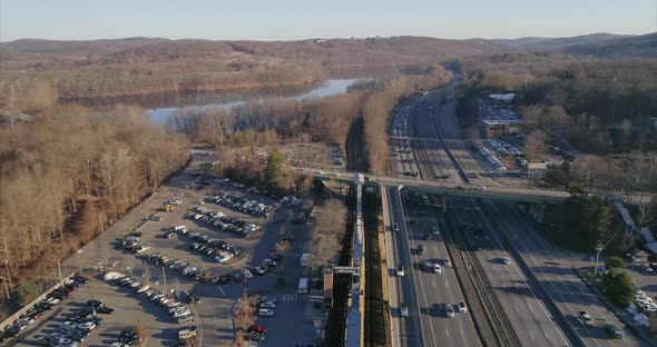 Flying over train tracks along Interstate 684 and the Croton River alt