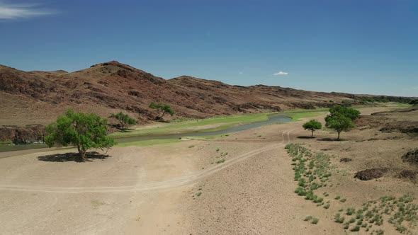 Aerial Landscape View of River in Gobi Desert Mongolia alt
