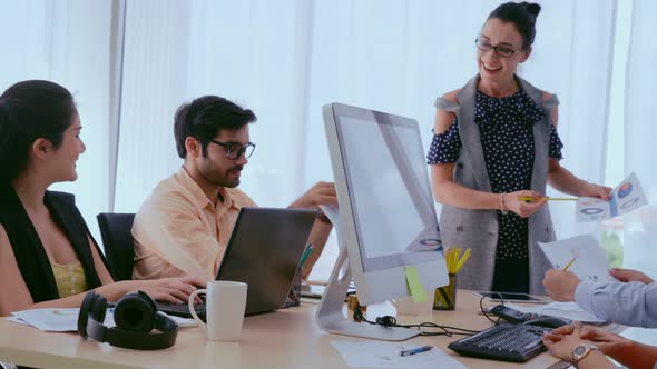 Senior Leader Giving Advice Speech to Team Members alt