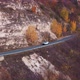 Car Driving on Mountain Slope Near Autumn Trees - VideoHive Item for Sale