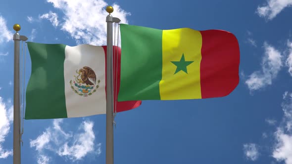 Mexico Flag Vs Senegal Flag On Flagpole alt