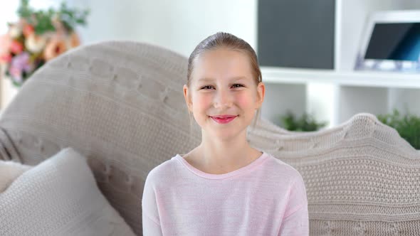 Portrait Beautiful Laughing Girl Happy Child Posing Having Fun Looking at Camera alt
