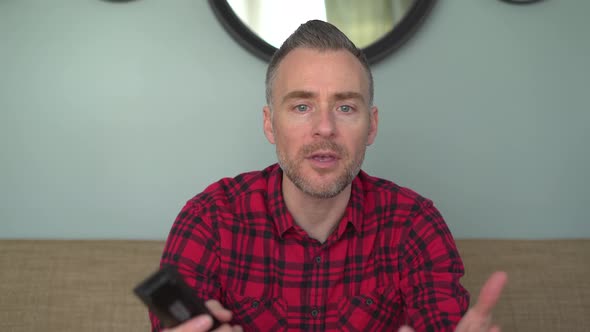 Man Gets Angry About Something on Television alt