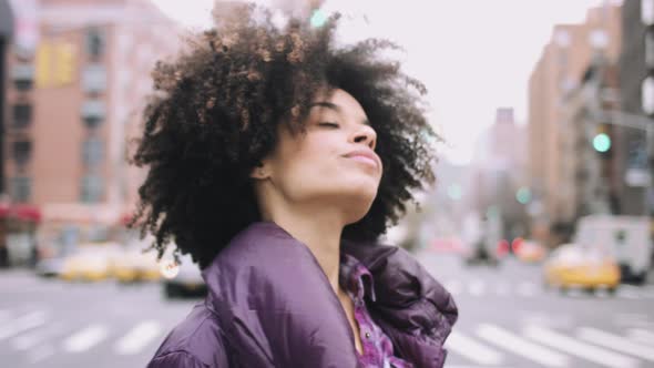 Portrait of Afro American Female standing in street, Manhattan New York