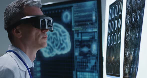 Doctor Examining Brain Scan with VR Headset alt