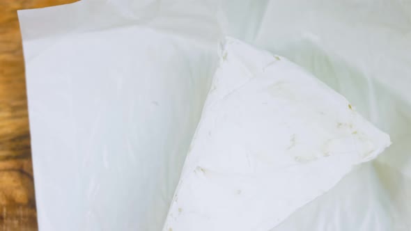 The Chef Cuts Brie Cheese alt