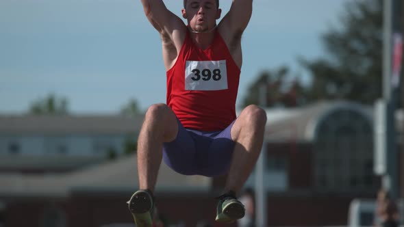 Track athlete doing long jump in super slow motion, shot on Phantom Flex 4K