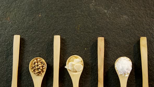 Various spices arranged in a spoon 4k alt