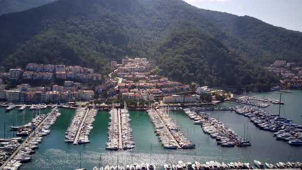 Drone view on beautiful Fethiye city and Fethiye harbor full of yachts and boats