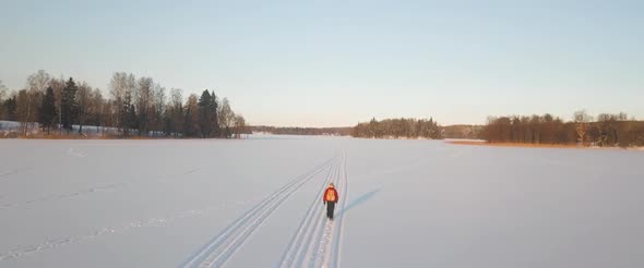 Walking On The Icy Lake Drone Footage alt