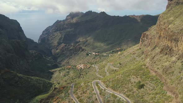 Aerial View of Mountain Road and Town in Masca Valley alt