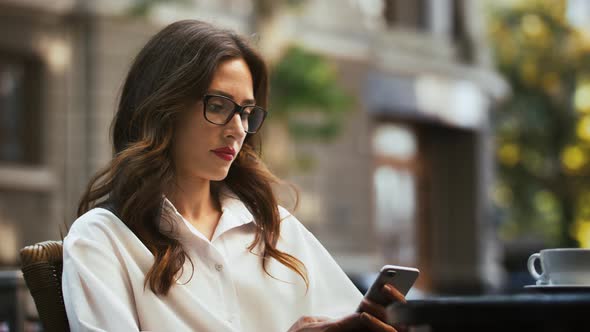 Business Woman in Glasses White Shirt alt