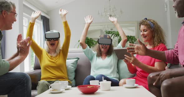 Animation of happy diverse female and male senior friends using vr headset and having fun alt