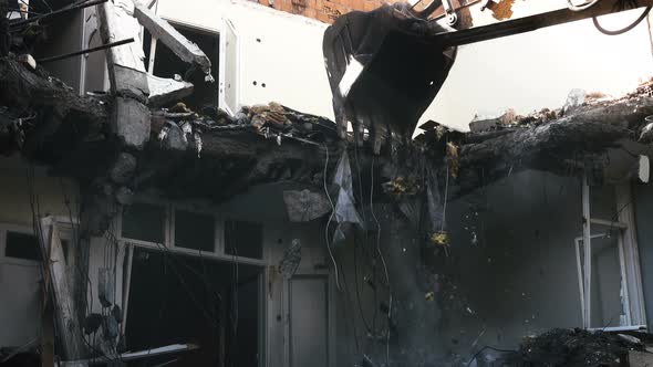 Destroying Old House With Bulldozer Mechanical Arm alt