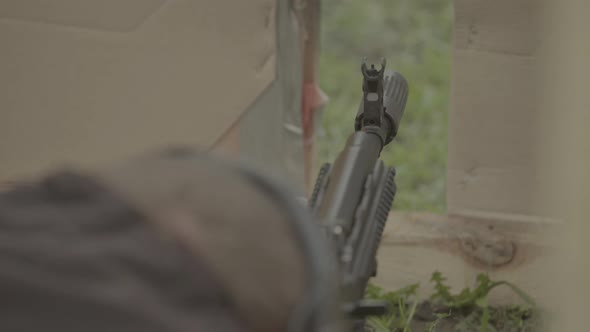 Rifle Shooter During Shooting. Close-up alt